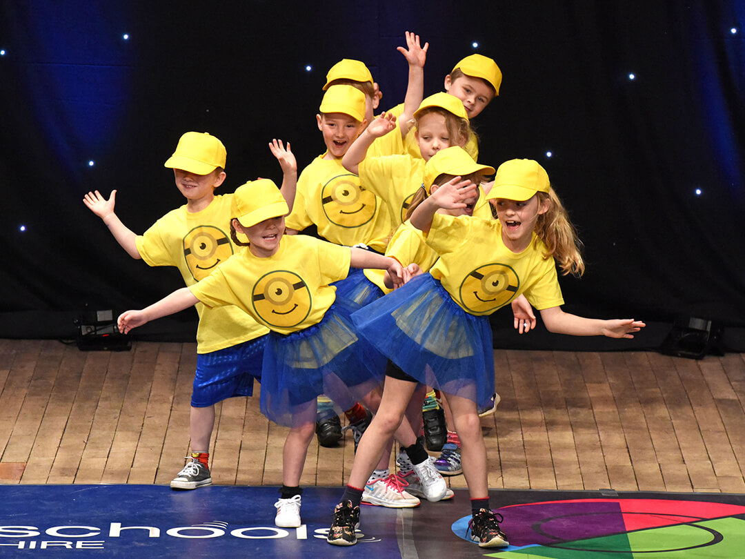 Dance group with minions t-shirts