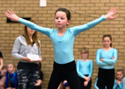 Young girl gymnastics competition