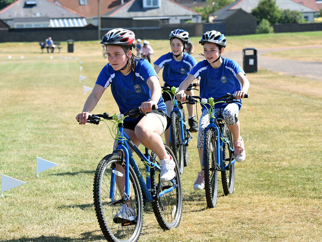 Team of three cyclist competing in a race